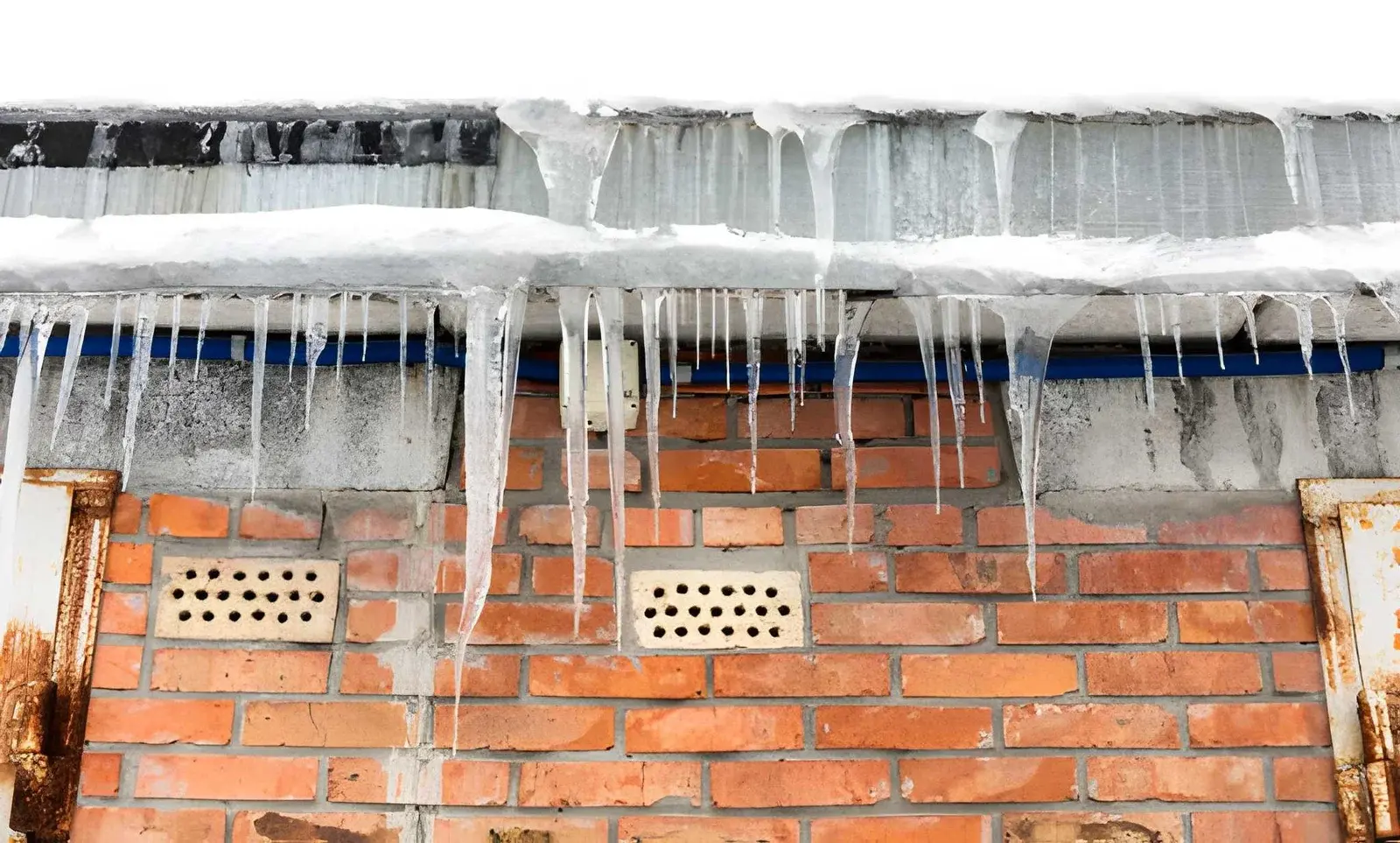 Why Ice Dams Form on Roofs and How to Prevent Winter Leaks
